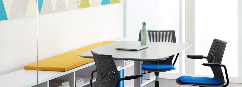 Meeting area with MultiGeneration by Knoll® – Light Task Chair. Modern design with blue seat and black frame.