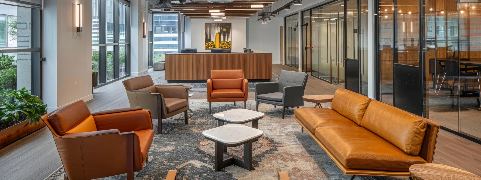 Modern office space featuring contract furniture: chairs, sofa, and tables in a commercial setting.