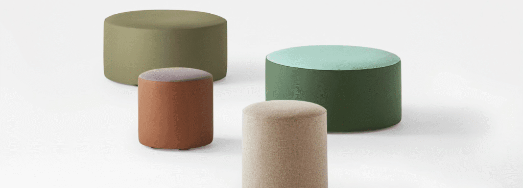 AUTO-DRAFT: Modern round ottomans in green, brown, and beige hues. Stylish seating for any space.