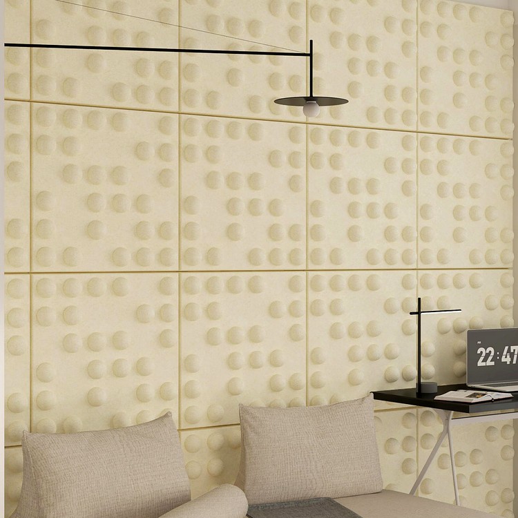 Da Vinci Code acoustic panels featuring a cream-colored grid of 3D hemispherical textures on a modern felt surface.