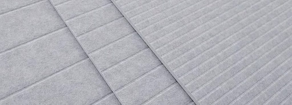 Light grey Fluted Acoustic Slat Panel featuring textured PET felt ribs with parallel grooves in a modern design.