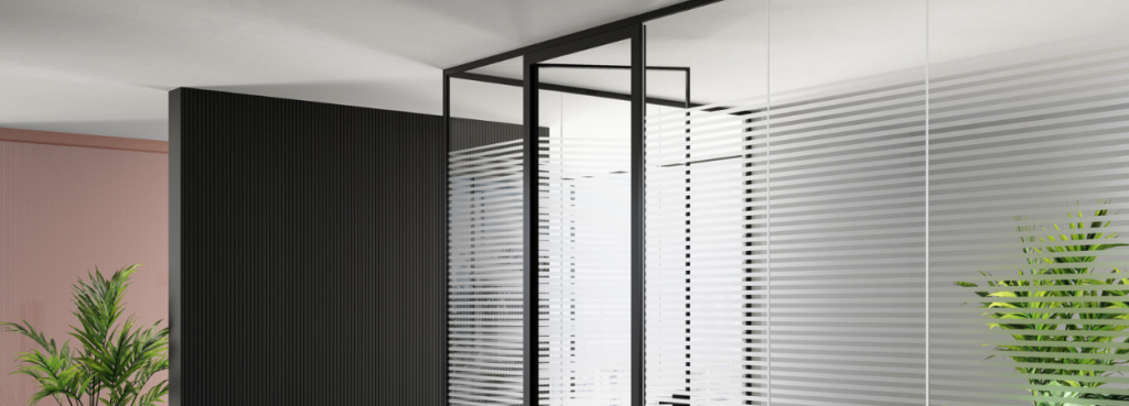 Mood M1 partition with horizontal frosted glass stripes, black frame, and adjacent fluted black and terracotta walls.