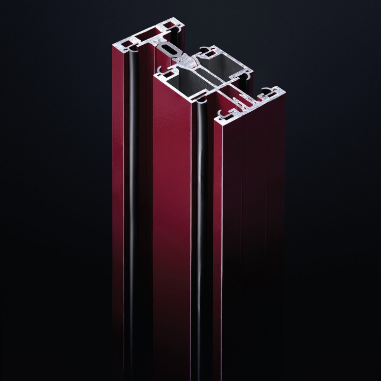 Close-up of the Silence Loft Fire-Resistant System red aluminum frame profile against a dark background.