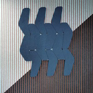 Wide Slat Acoustic Panel background with layered, dark blue geometric PET felt shapes in an overlapping pattern.