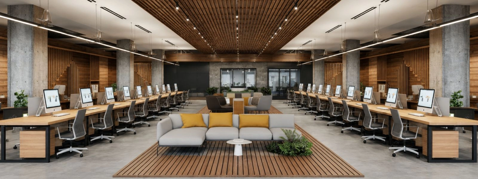 Modern open-plan office with acoustic wooden ceiling panels, long workstations, and a central lounge area for productivity.